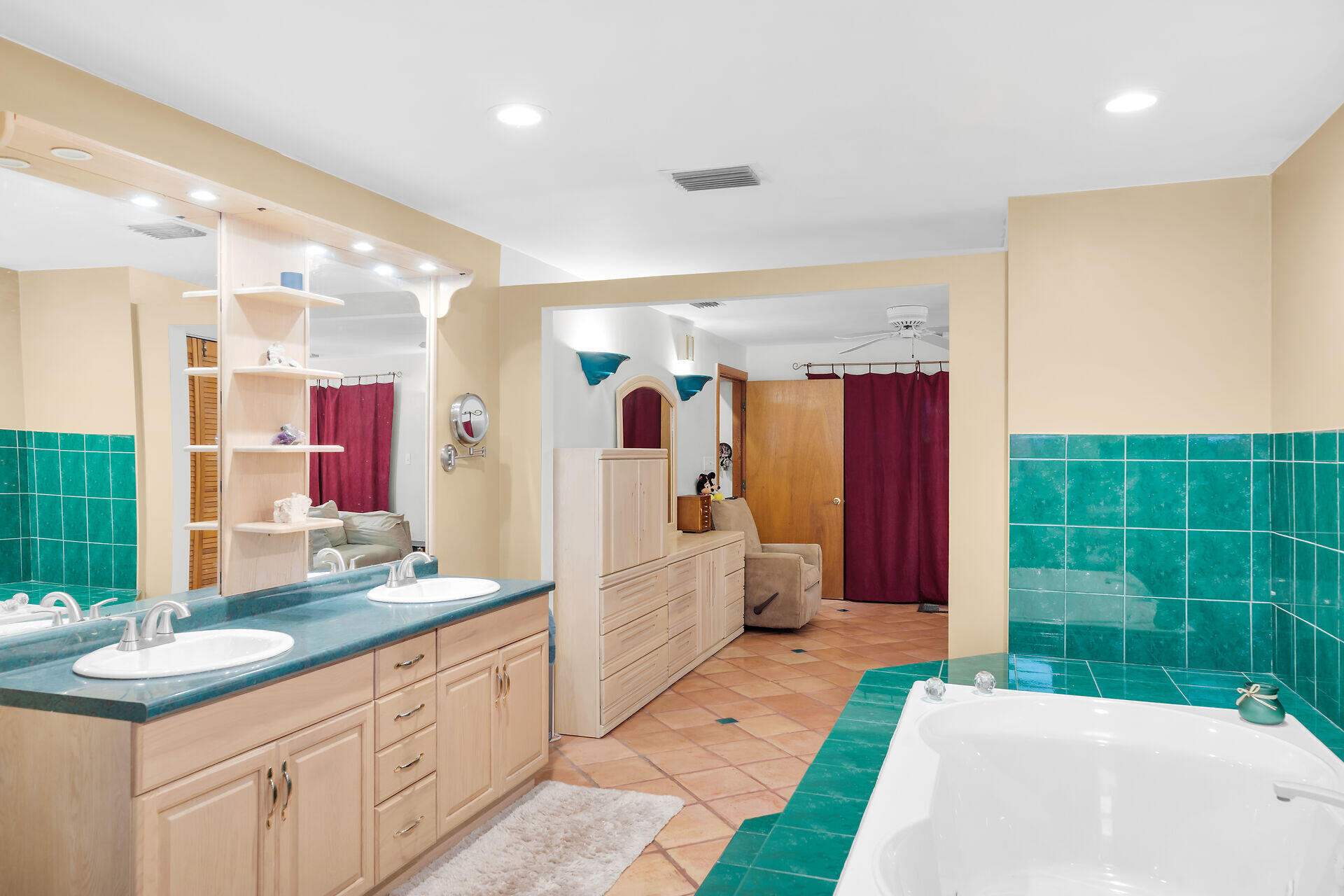 323 Bayview Avenue Key Largo, FL 33037 - Photo 14 of 46 a spacious bathroom with a double vanity sink and a mirror