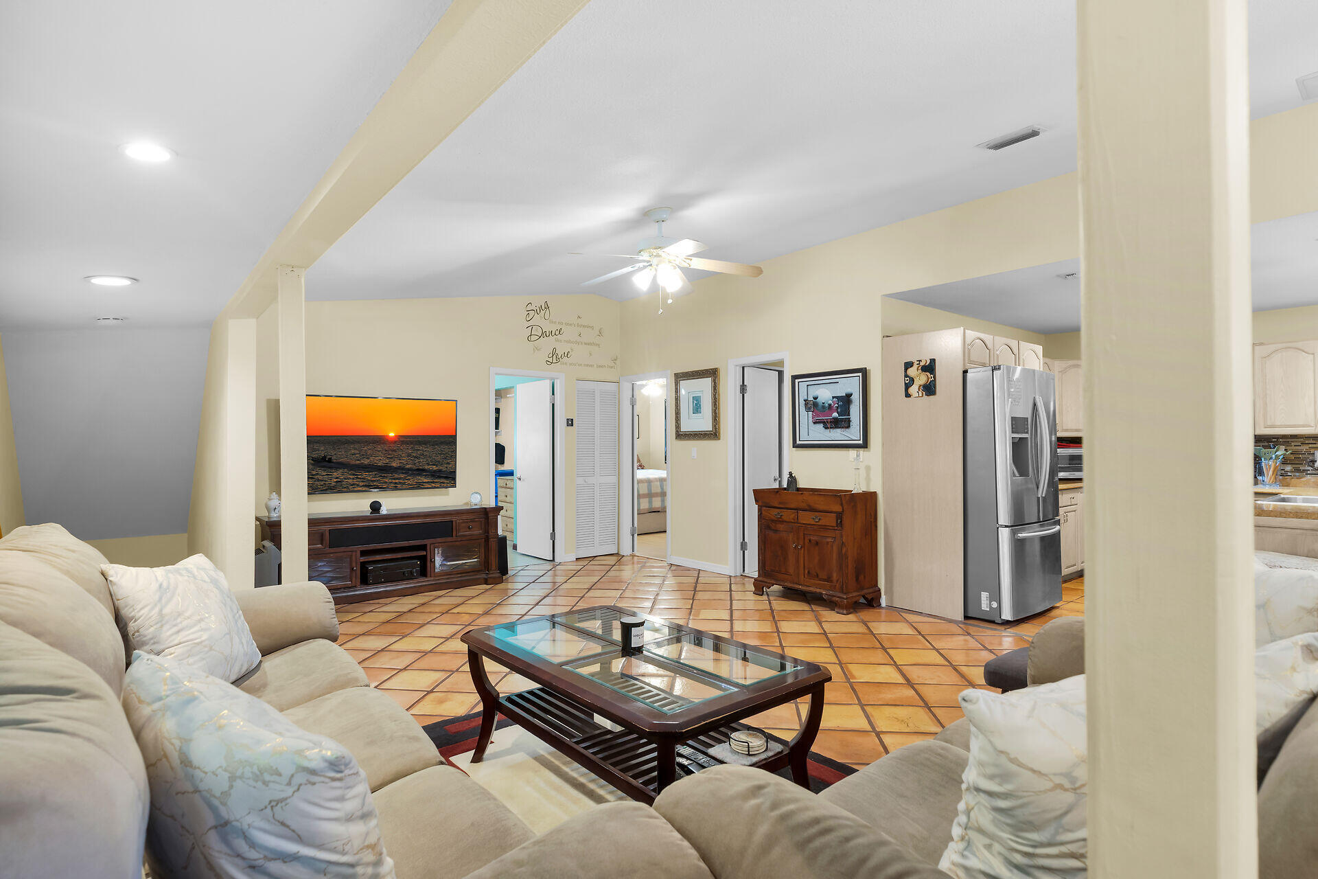 323 Bayview Avenue Key Largo, FL 33037 - Photo 22 of 46 a living room with furniture and a flat screen tv