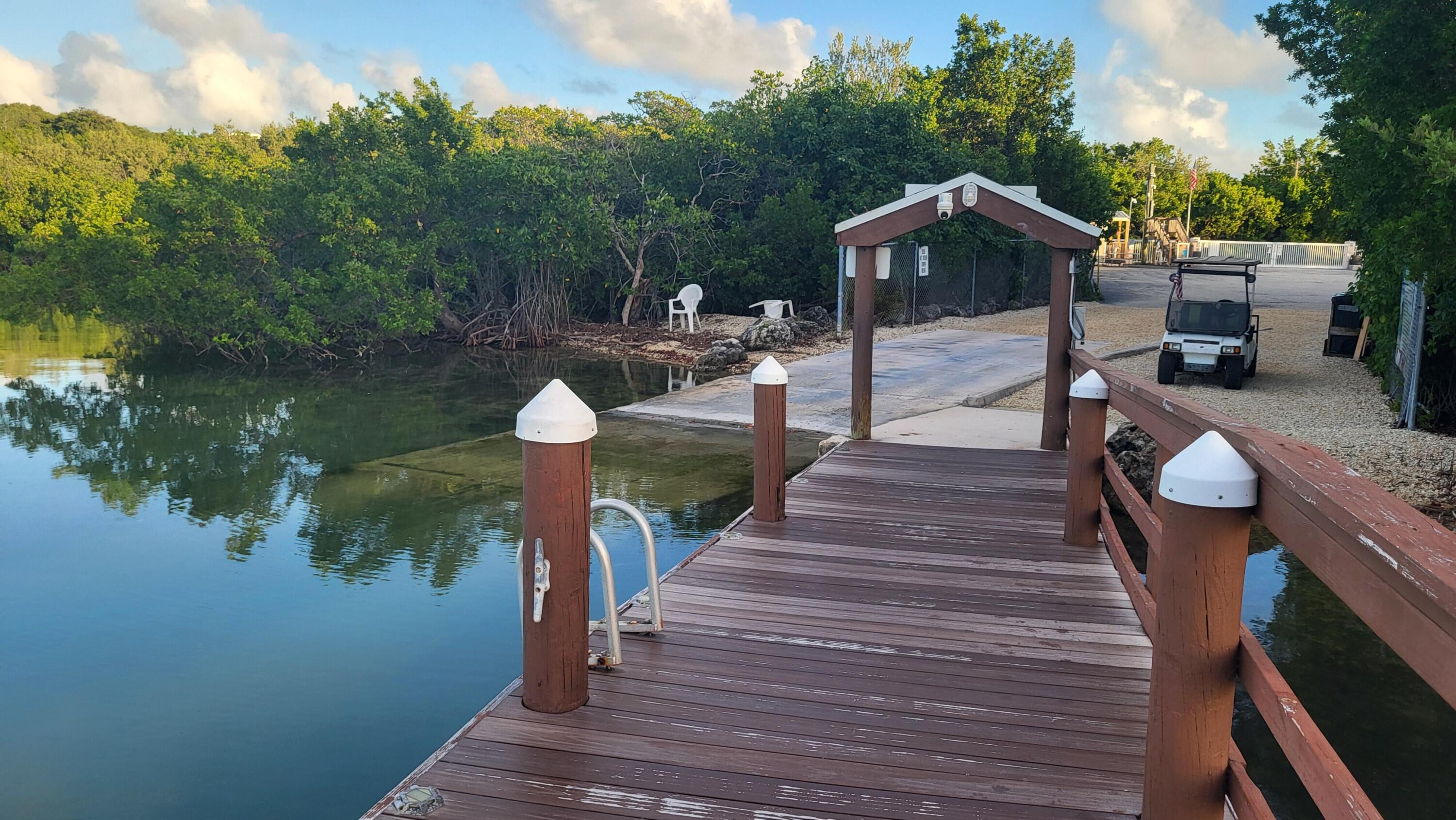 323 Bayview Avenue Key Largo, FL 33037 - Photo 37 of 46 a view of a house with backyard and sitting area