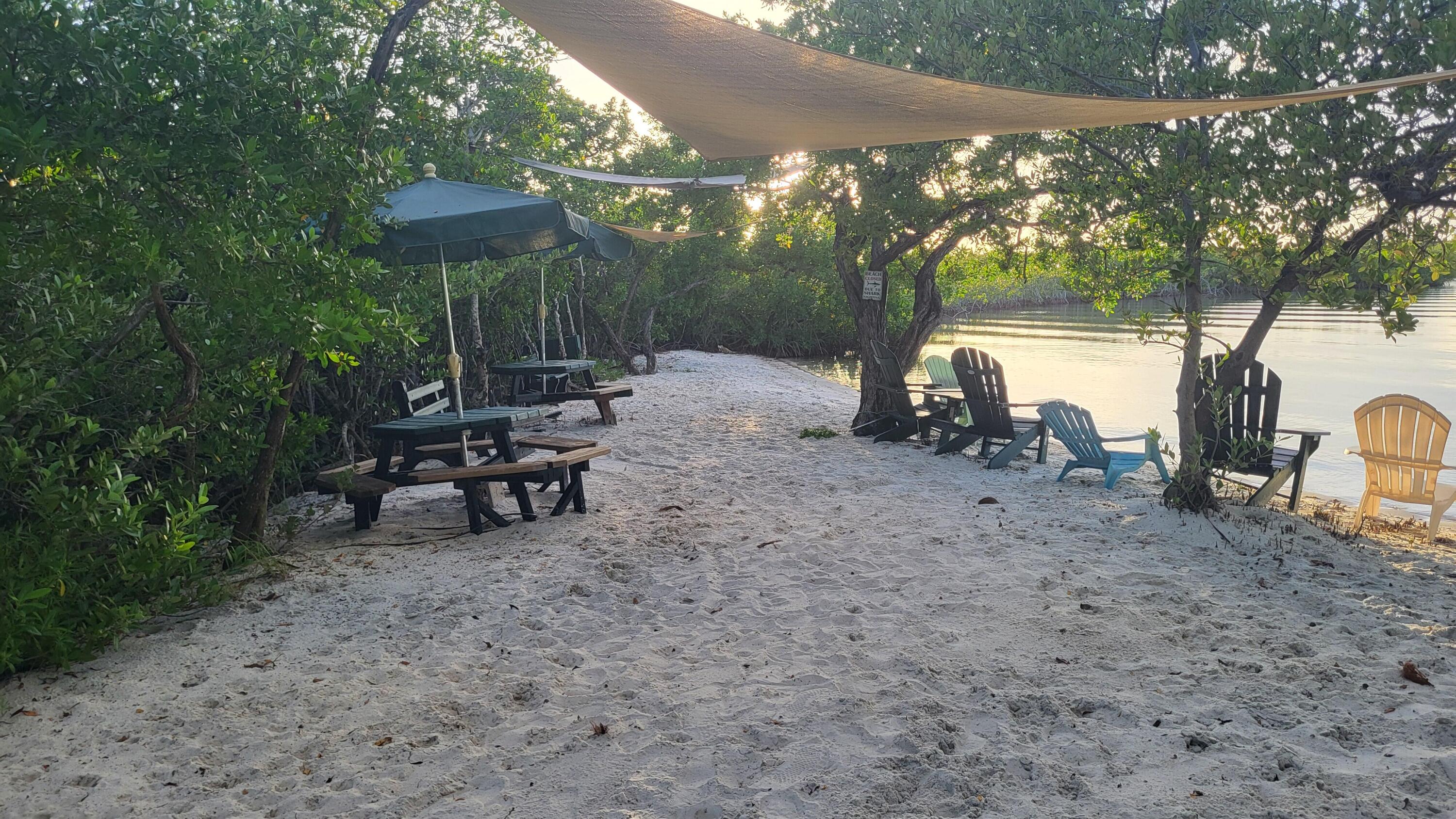 323 Bayview Avenue Key Largo, FL 33037 - Photo 40 of 46 a view of a house with backyard porch and sitting area