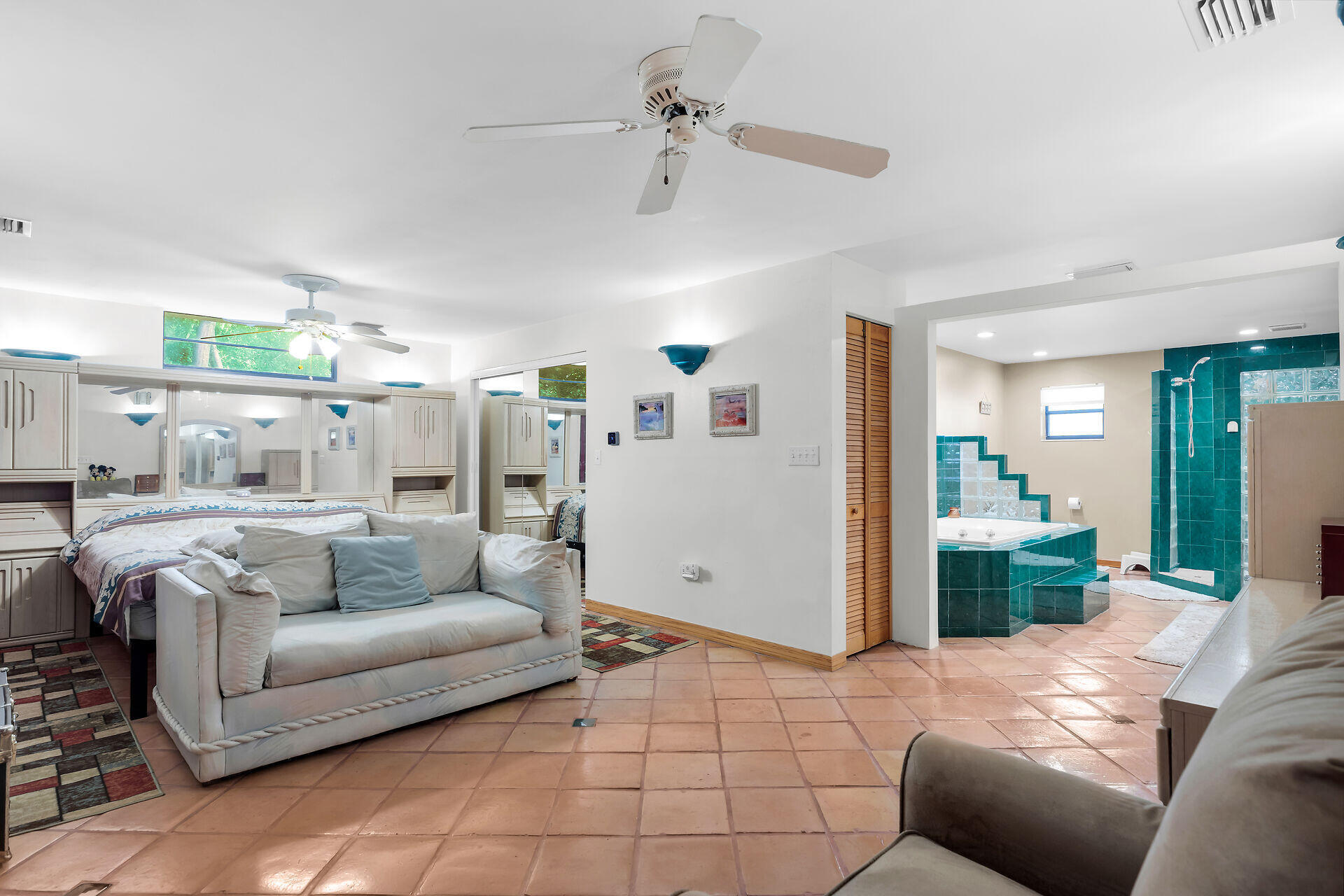 323 Bayview Avenue Key Largo, FL 33037 - Photo 9 of 46 a living room with furniture and a large window
