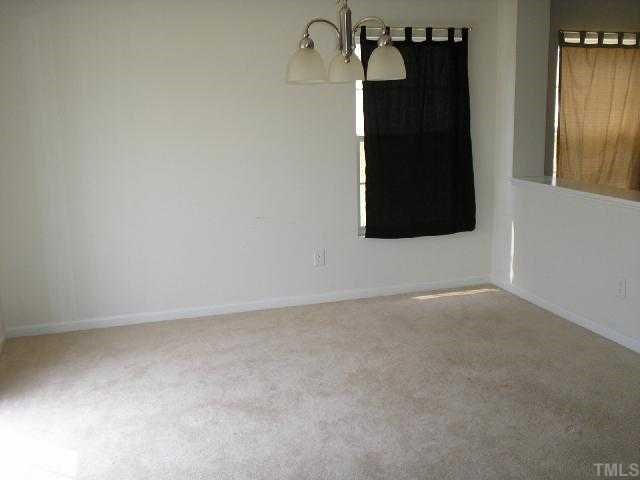 6004 Namozine Court Raleigh, NC 27610 - Photo 7 of 12 a view of an empty room