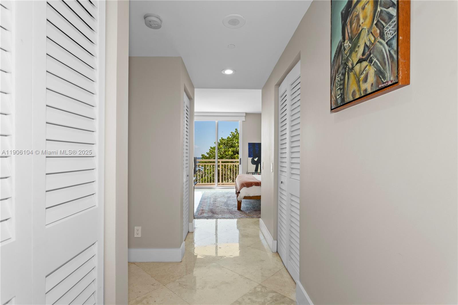 2475 Brickell Avenue, Unit 708 Miami, FL 33129 - Photo 19 of 21 a view of a hallway with wooden floor and windows
