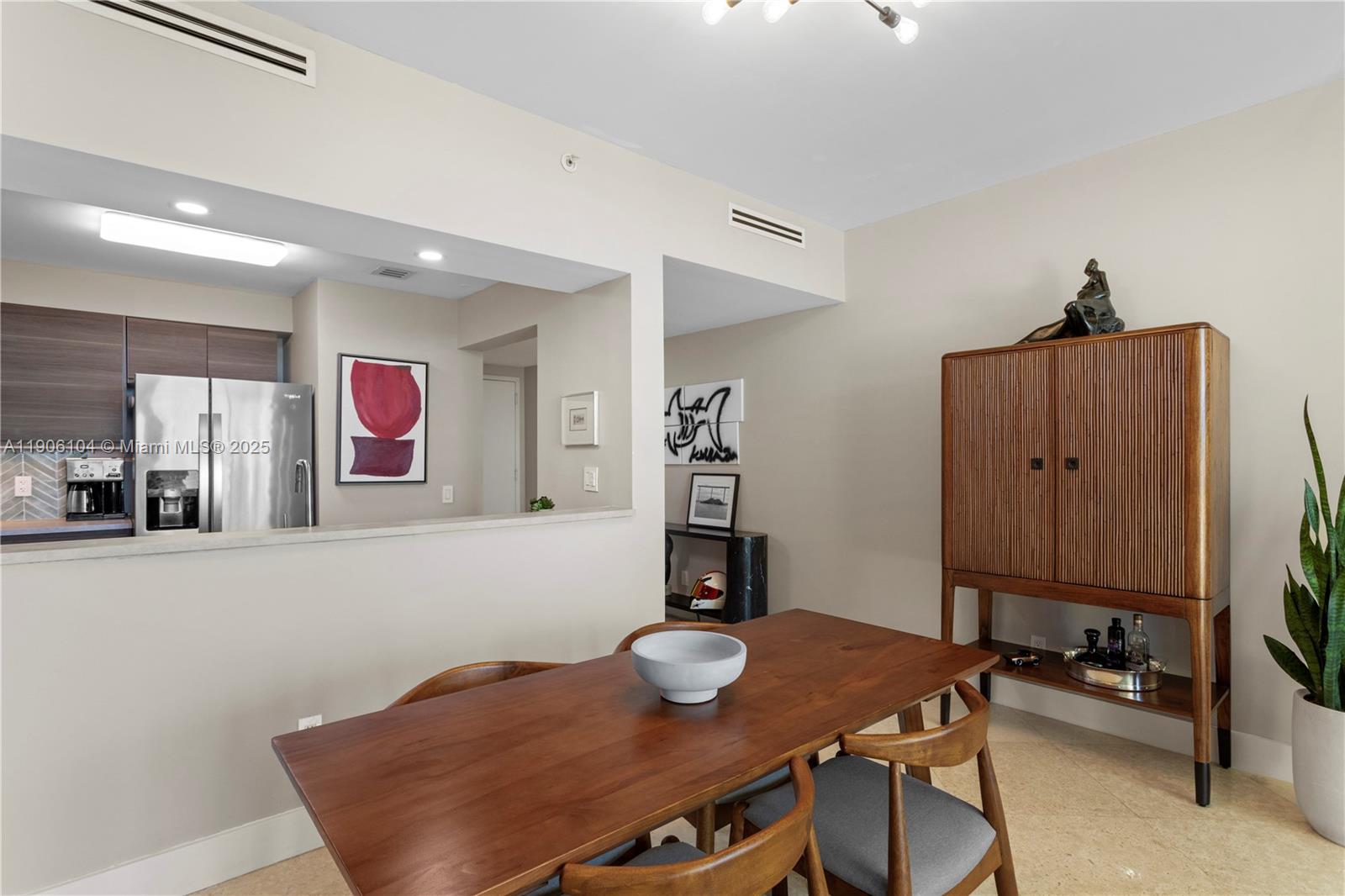 2475 Brickell Avenue, Unit 708 Miami, FL 33129 - Photo 3 of 21 a view of a workspace with furniture