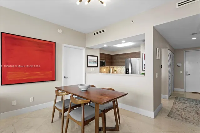a view of a dining room with furniture