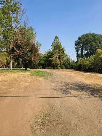 a view of swimming pool with an outdoor space and seating area
