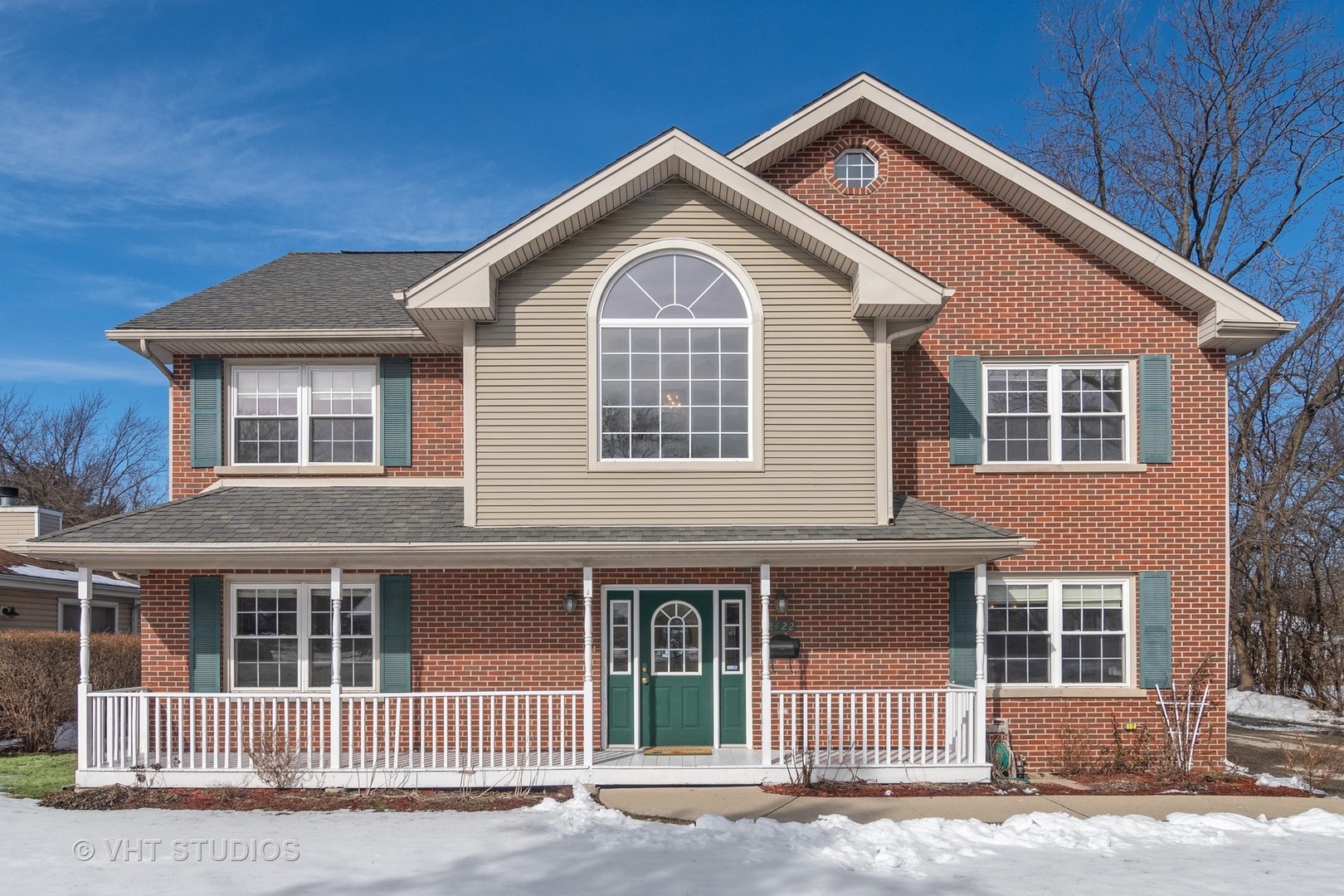 2422 Central Road Glenview, IL 60025 - Photo 1 of 18 a front view of a house with a yard