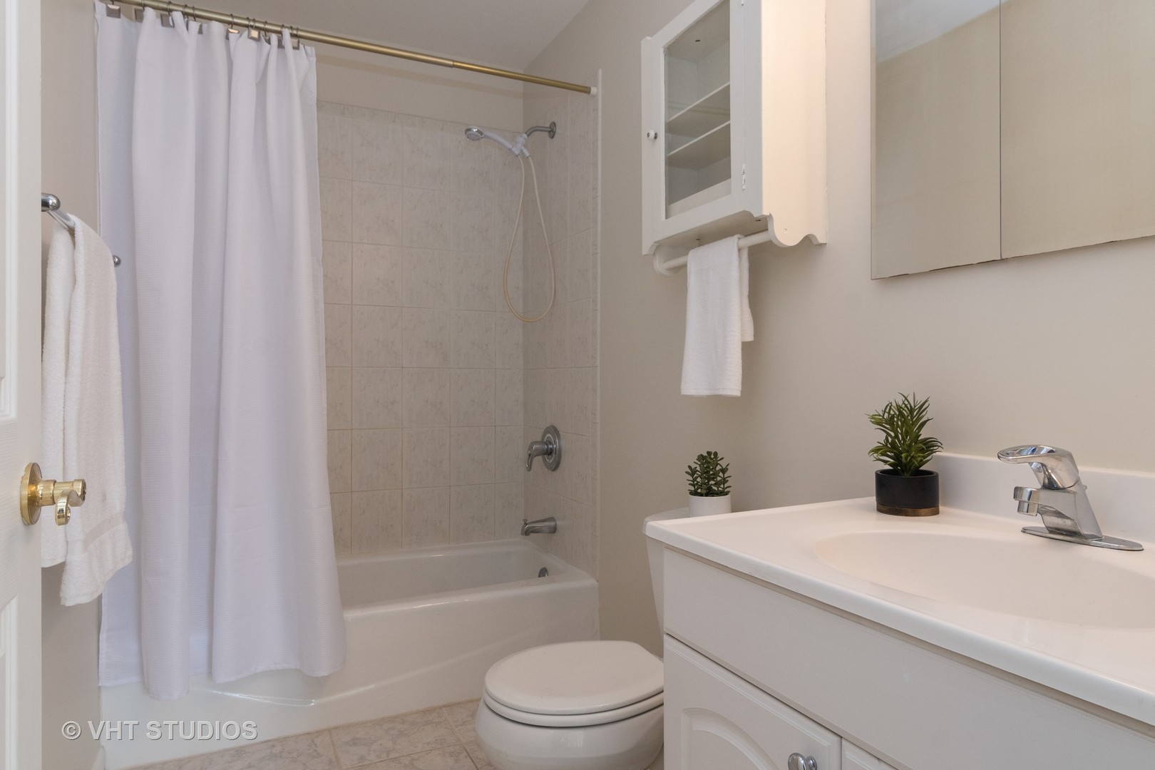2422 Central Road Glenview, IL 60025 - Photo 16 of 18 a bathroom with a sink a toilet and shower