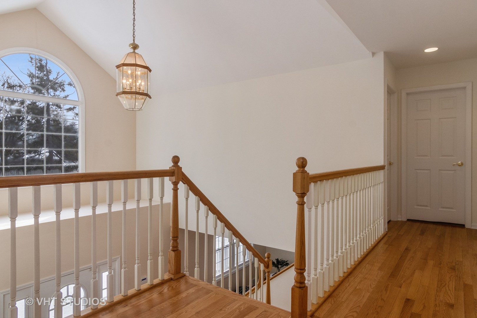 2422 Central Road Glenview, IL 60025 - Photo 17 of 18 a view of a hallway with wooden floor and staircase