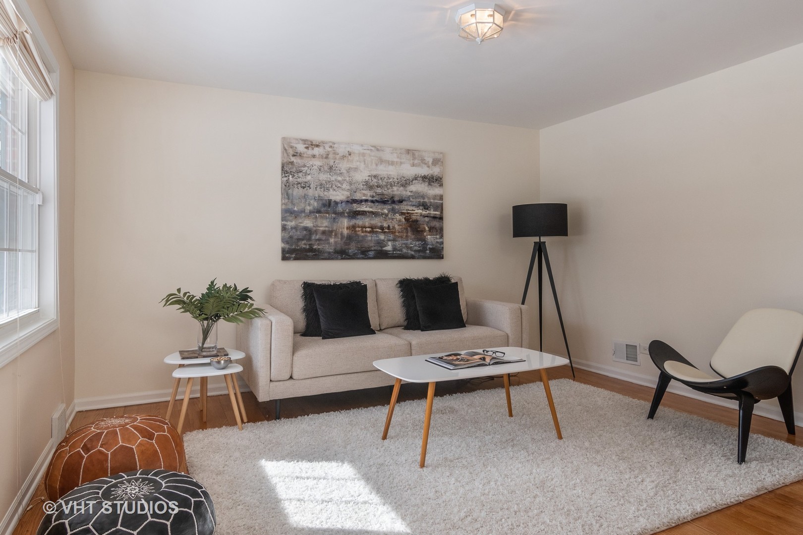 2422 Central Road Glenview, IL 60025 - Photo 3 of 18 a living room with furniture and a potted plant