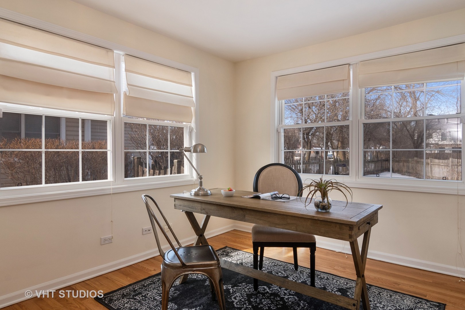 2422 Central Road Glenview, IL 60025 - Photo 9 of 18 a table and chair sitting in a room