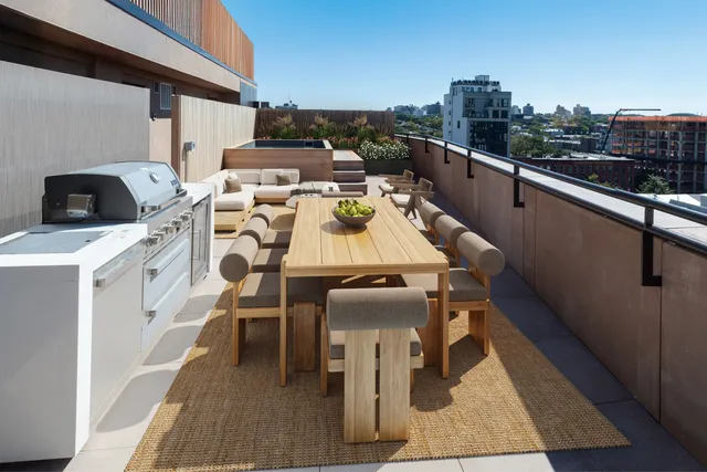 a spacious bedroom with a large bed and a large window