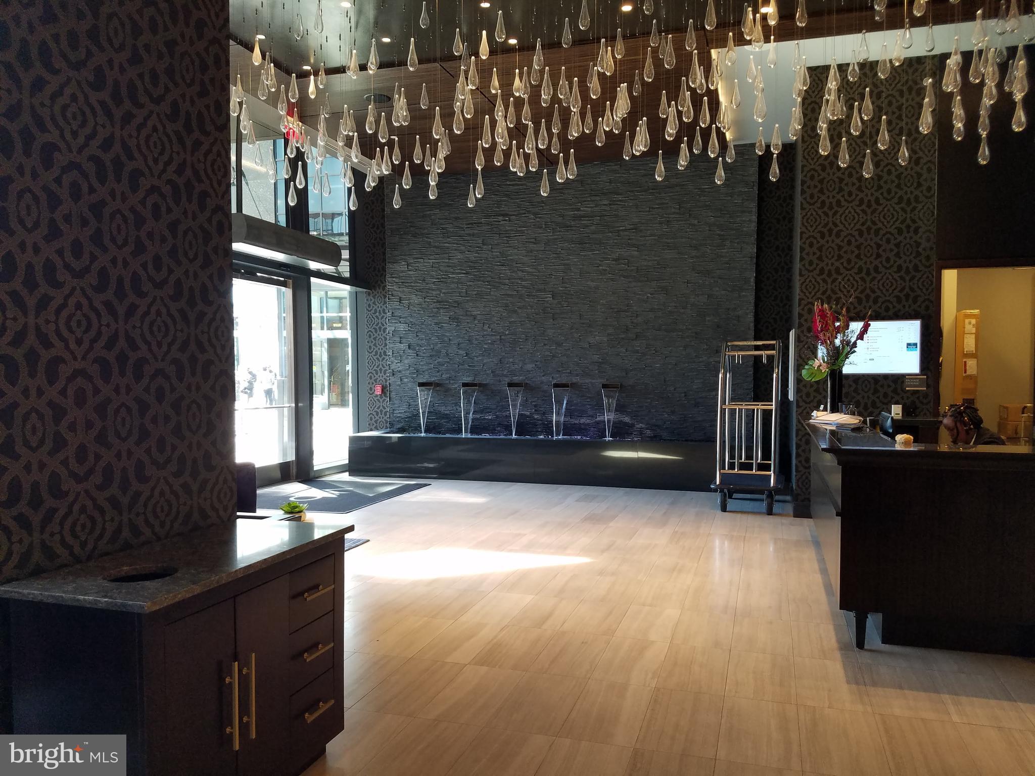 45 Sutton Square Southwest, Unit 906 Washington, DC 20024 - Photo 28 of 31 Building lobby with 24 hours security