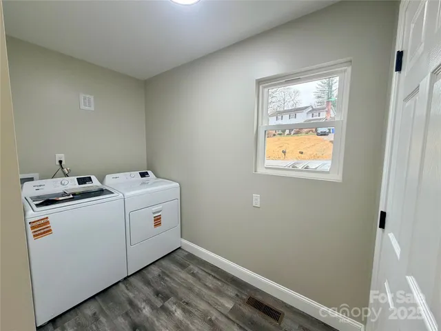 a utility room with dryer and washer