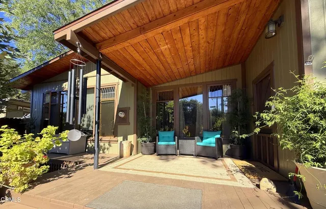 a view of potted plants in front of building