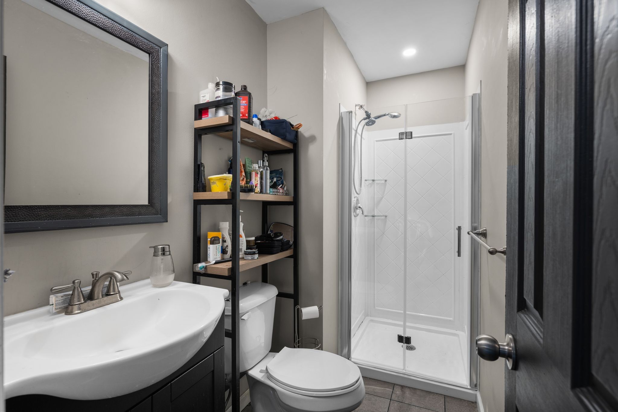 1516 Richmond Road Columbia, TN 38401 - Photo 17 of 26 a bathroom with a sink toilet and shower