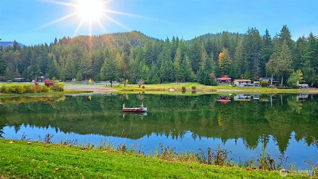 a view of lake with green space