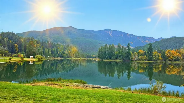 a view of lake with mountain