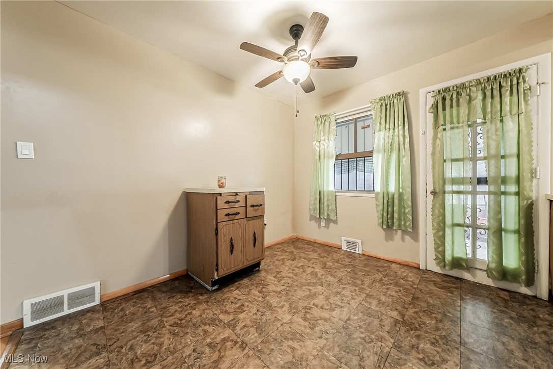 20620 Donnybrook Road Maple Heights, OH 44137 - Photo 8 of 32 Empty room featuring ceiling fan and baseboards