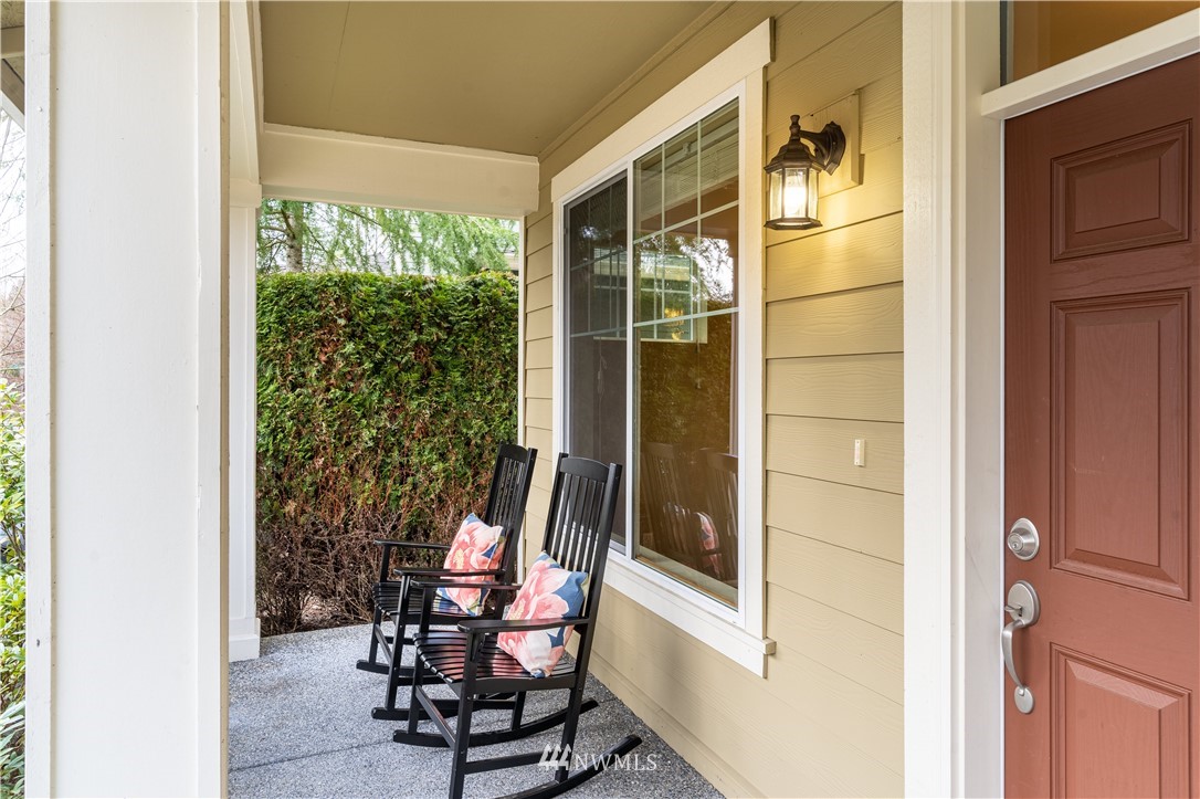 3801 219th Place Southeast Bothell, WA 98021 - Photo 11 of 22 a view of a door and chair in the balcony