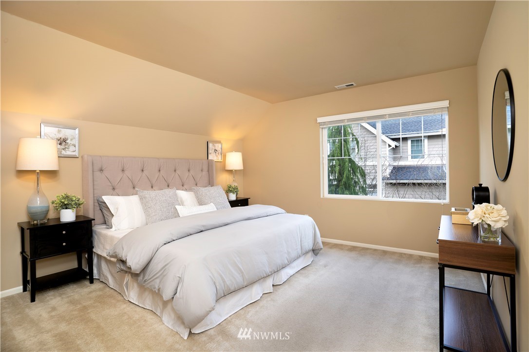 3801 219th Place Southeast Bothell, WA 98021 - Photo 13 of 22 a bedroom with a bed and a window