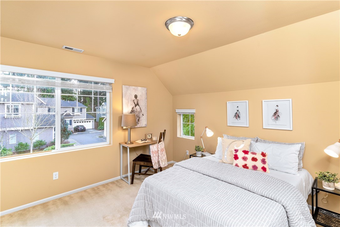 3801 219th Place Southeast Bothell, WA 98021 - Photo 15 of 22 a bedroom with a bed and a table