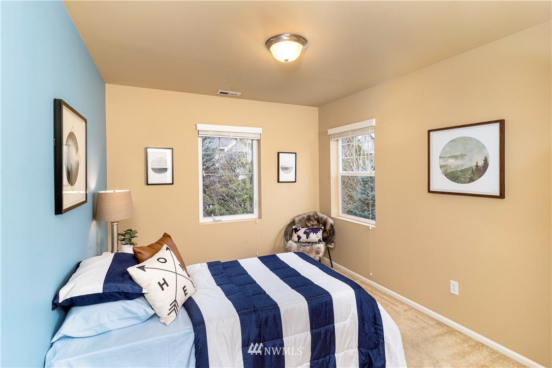 3801 219th Place Southeast Bothell, WA 98021 - Photo 16 of 22 a bed room with a bed and a window