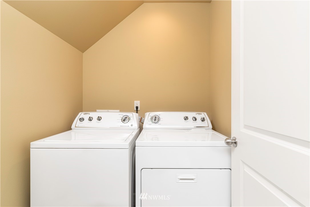3801 219th Place Southeast Bothell, WA 98021 - Photo 18 of 22 a utility room with dryer and washer