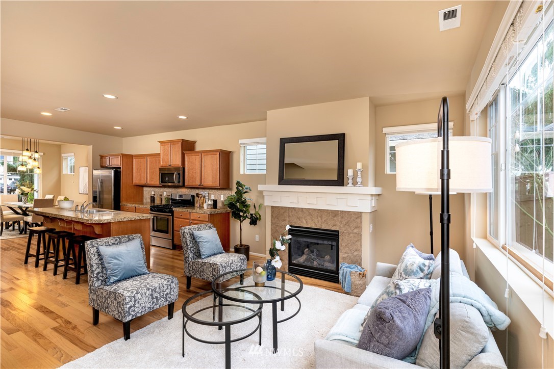 3801 219th Place Southeast Bothell, WA 98021 - Photo 6 of 22 a living room with furniture fireplace and a table