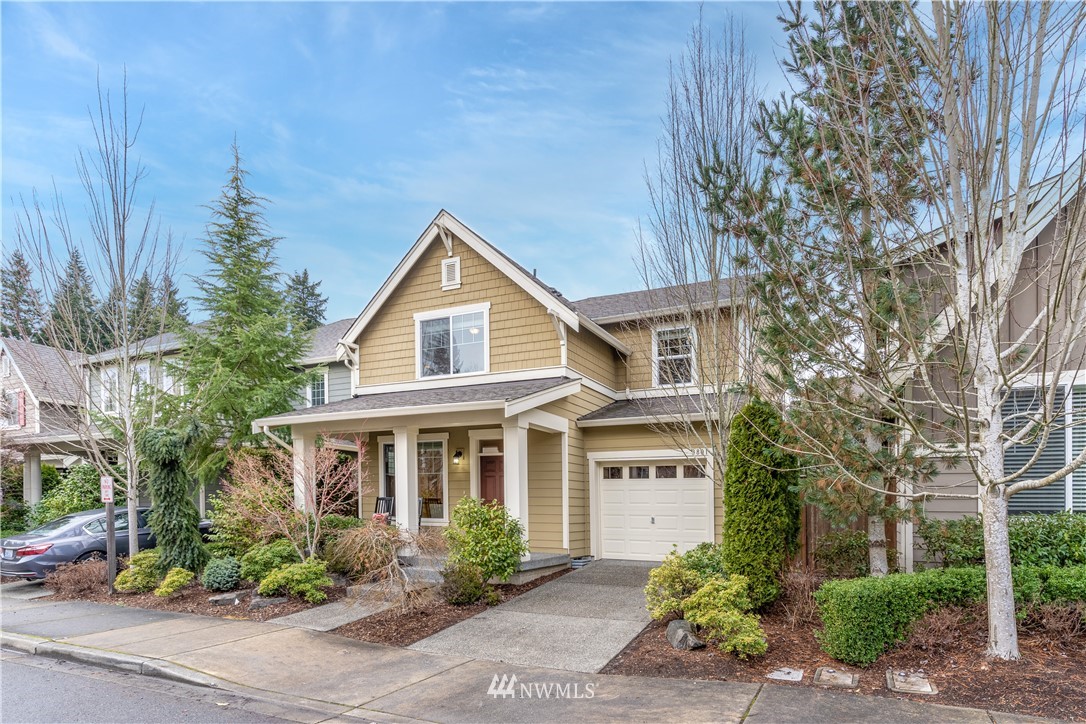 3801 219th Place Southeast Bothell, WA 98021 - Photo 10 of 22 a front view of a house with a yard