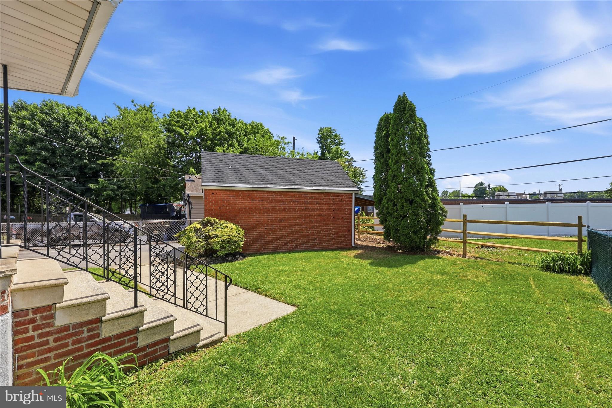 8 James Road Broomall, PA 19008 - Photo 35 of 35 a view of a house with backyard and sitting area