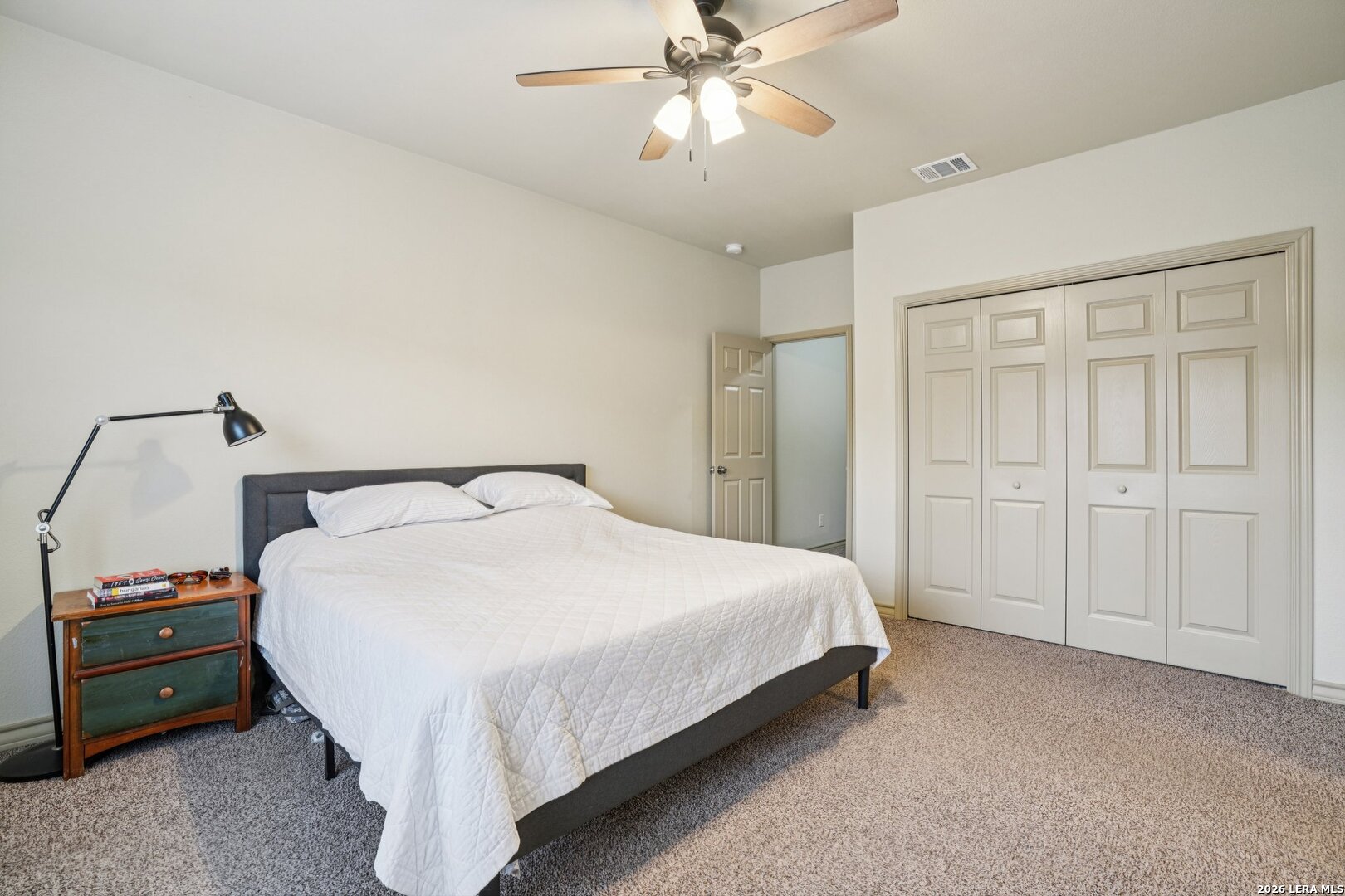 2312 Sailing Way, Unit A Kerrville, TX 78028 - Photo 15 of 29 a bedroom with a bed and a closet