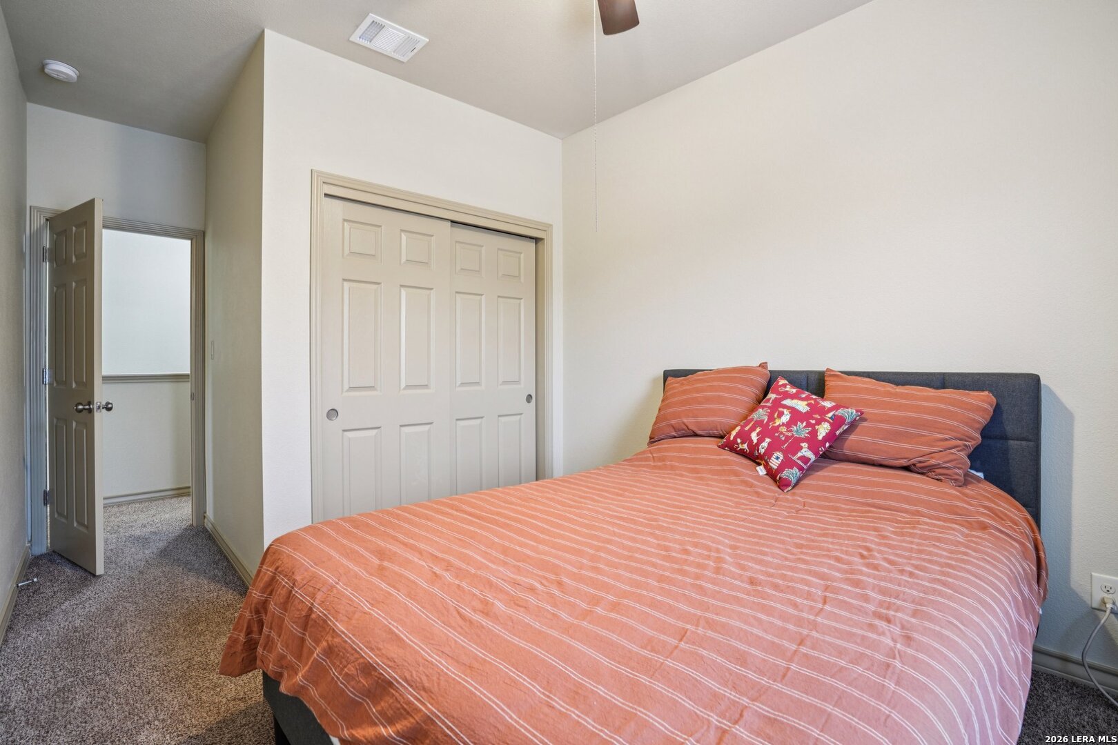 2312 Sailing Way, Unit A Kerrville, TX 78028 - Photo 21 of 29 a bedroom with a bed and a closet