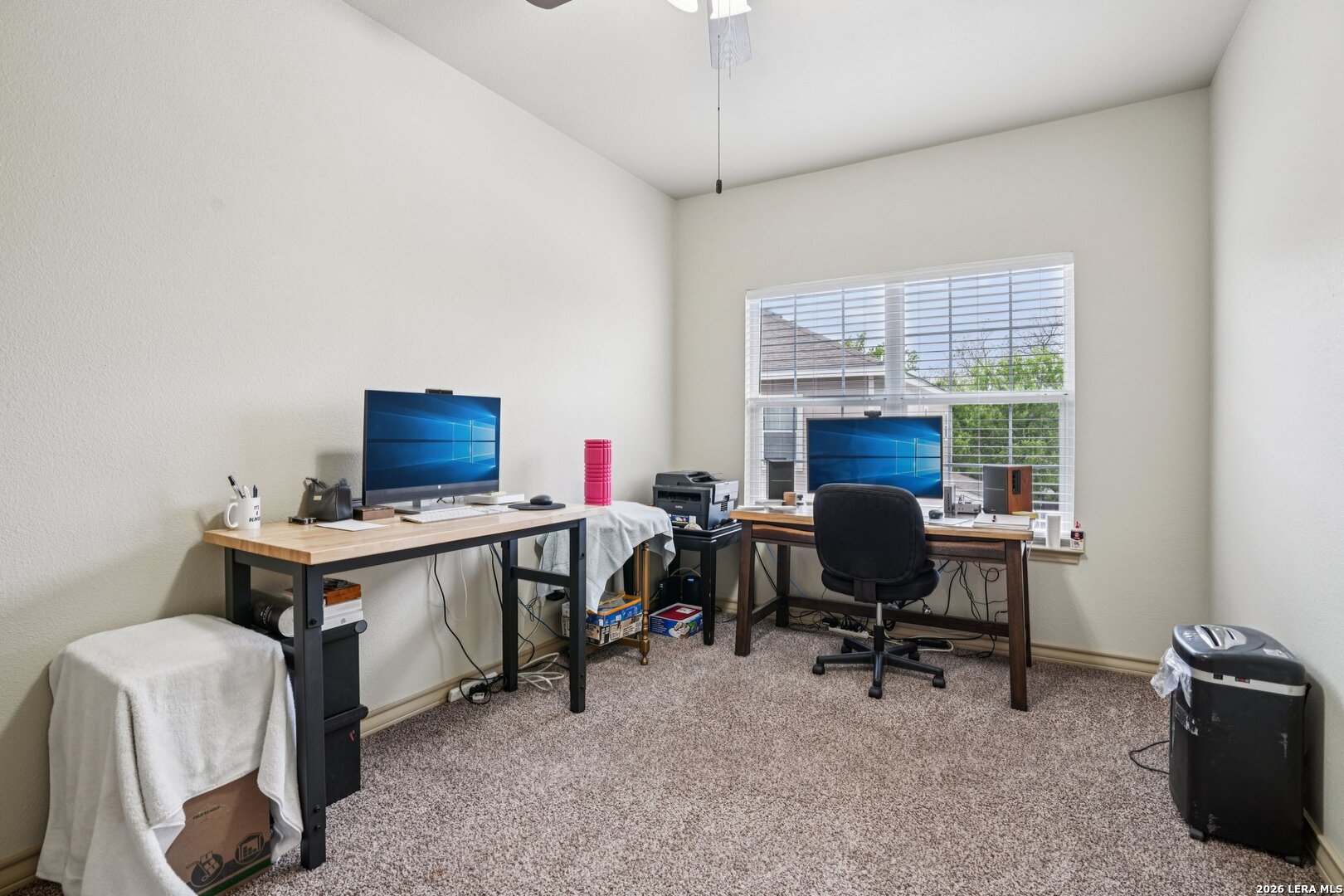 2312 Sailing Way, Unit A Kerrville, TX 78028 - Photo 25 of 29 a view of a workspace with furniture and a window