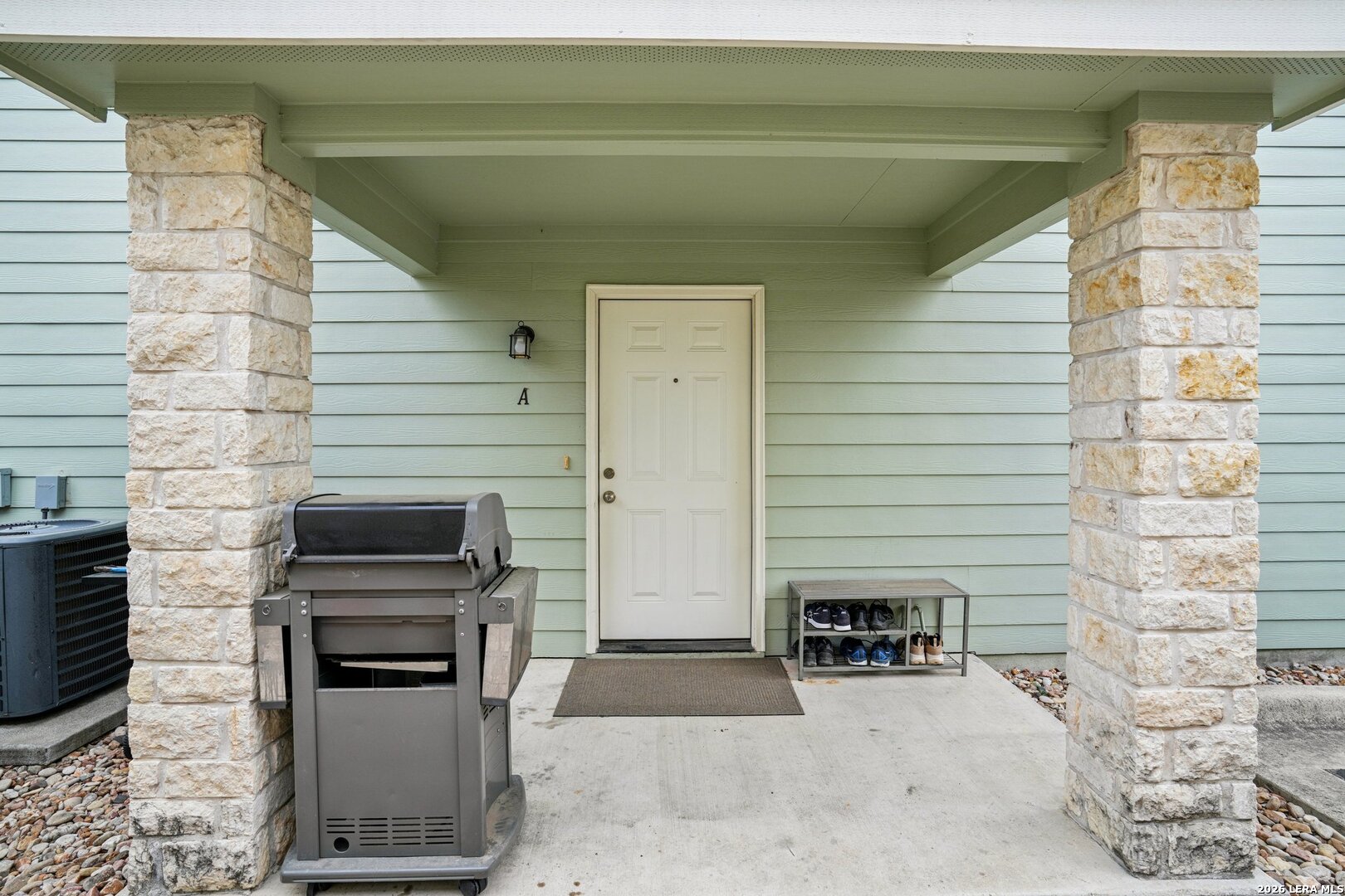 2312 Sailing Way, Unit A Kerrville, TX 78028 - Photo 3 of 29 a view of a door and chair in the balcony