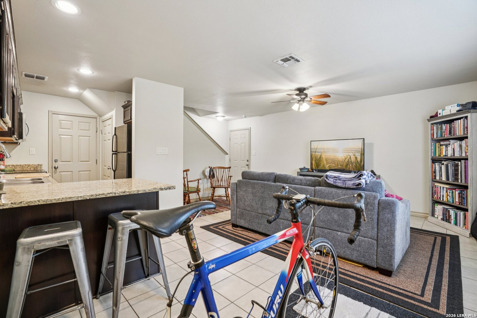 2312 Sailing Way, Unit A Kerrville, TX 78028 - Photo 9 of 29 a workspace with furniture and a flat screen tv