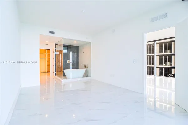 a bathroom with a double vanity sink mirror and a