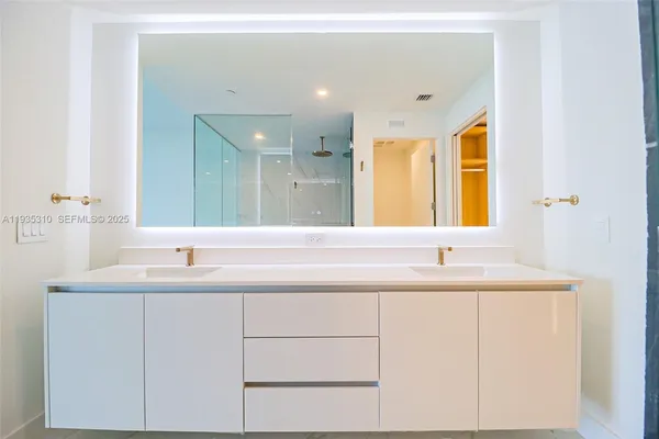 a view of an empty walk in closet