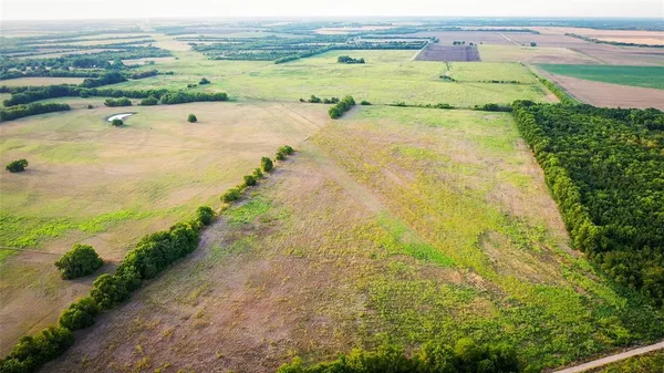 a view of an ocean and mountain