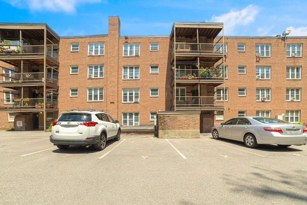 84 Strathmore Road, Unit 7 Boston, MA 02135 - Photo 15 of 17 a car parked in front of a building