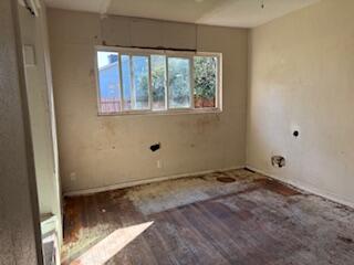 1200 3rd Street Redding, CA 96002 - Photo 15 of 31 a view of an empty room with a window