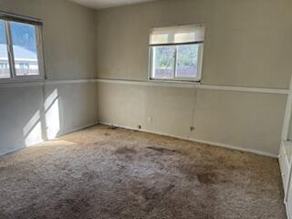 1200 3rd Street Redding, CA 96002 - Photo 17 of 31 an empty room with a window