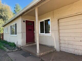 1200 3rd Street Redding, CA 96002 - Photo 20 of 31 a front view of a house with a garage