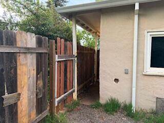 1200 3rd Street Redding, CA 96002 - Photo 3 of 31 a backyard of a house with wooden fence and stairs