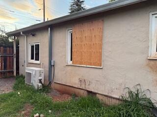 1200 3rd Street Redding, CA 96002 - Photo 5 of 31 a front view of a house with garden