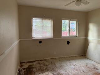 1200 3rd Street Redding, CA 96002 - Photo 8 of 31 an empty room with a window