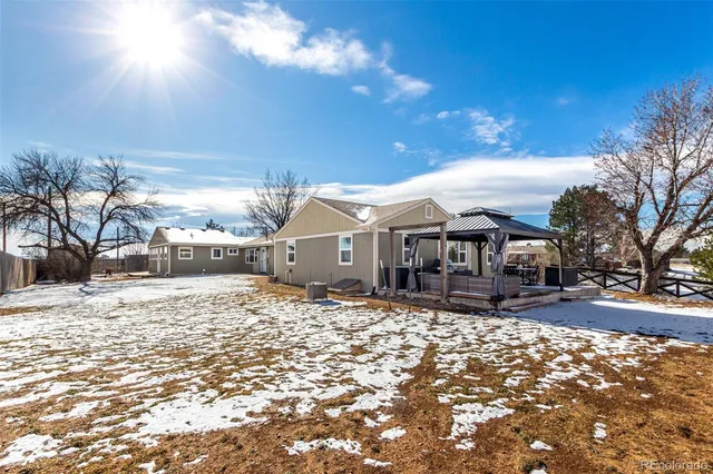 a view of a large house with a yard