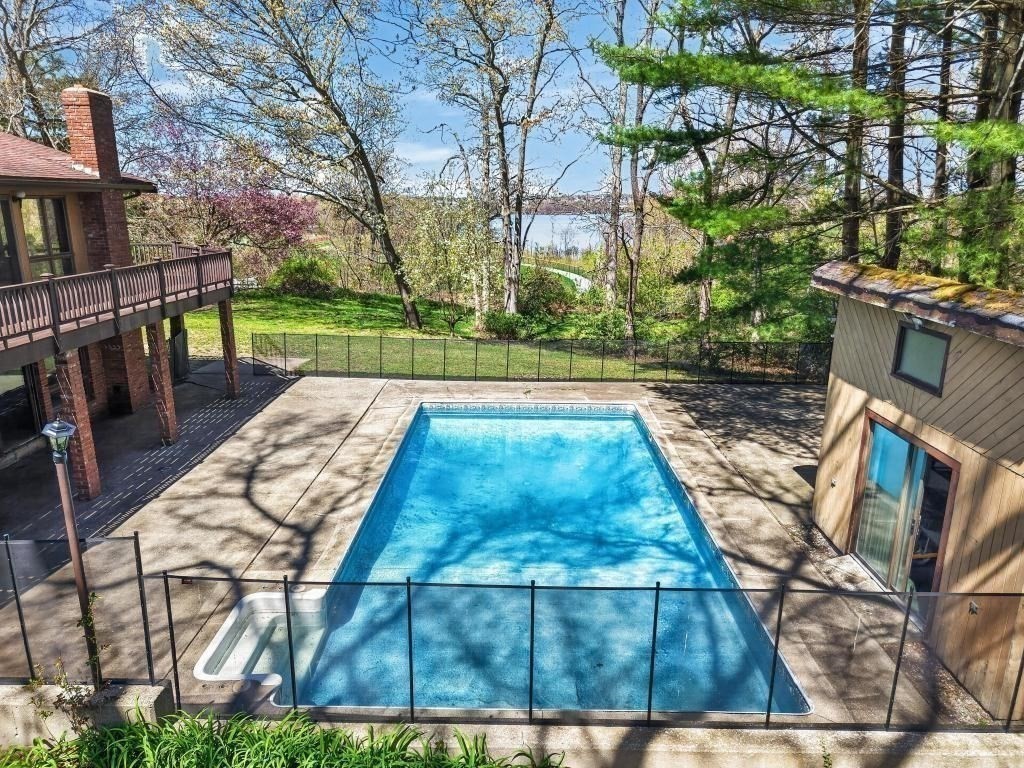 38 Gaudette Street Fall River, MA 02721 - Photo 8 of 41 a view of backyard with swimming pool