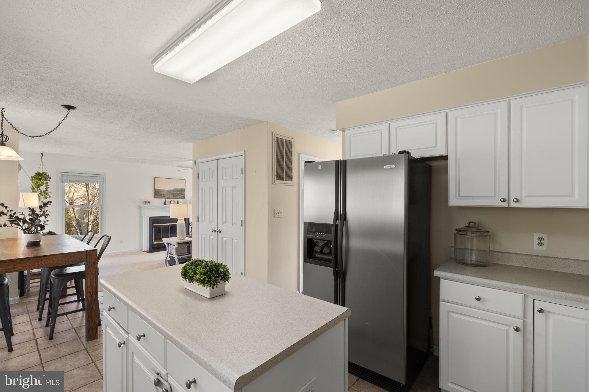 42 Lawhorn Road Stafford, VA 22554 - Photo 14 of 46 a kitchen with refrigerator and stove