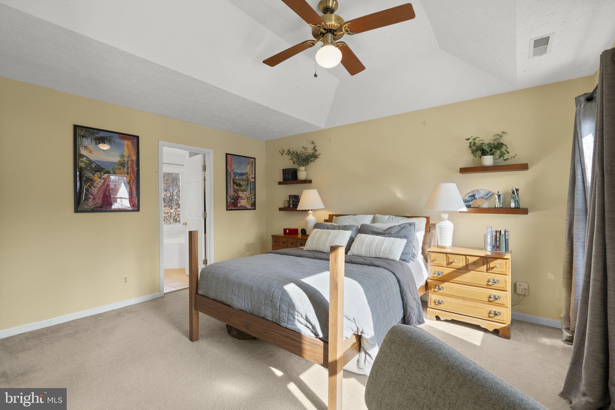 42 Lawhorn Road Stafford, VA 22554 - Photo 24 of 46 a bedroom with a bed and a painting on the wall